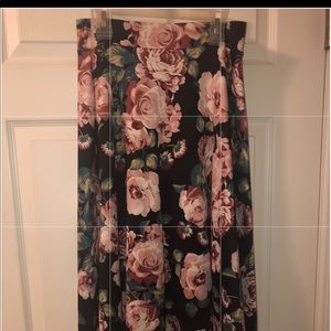 Bellow knee length floral skirt. Medium